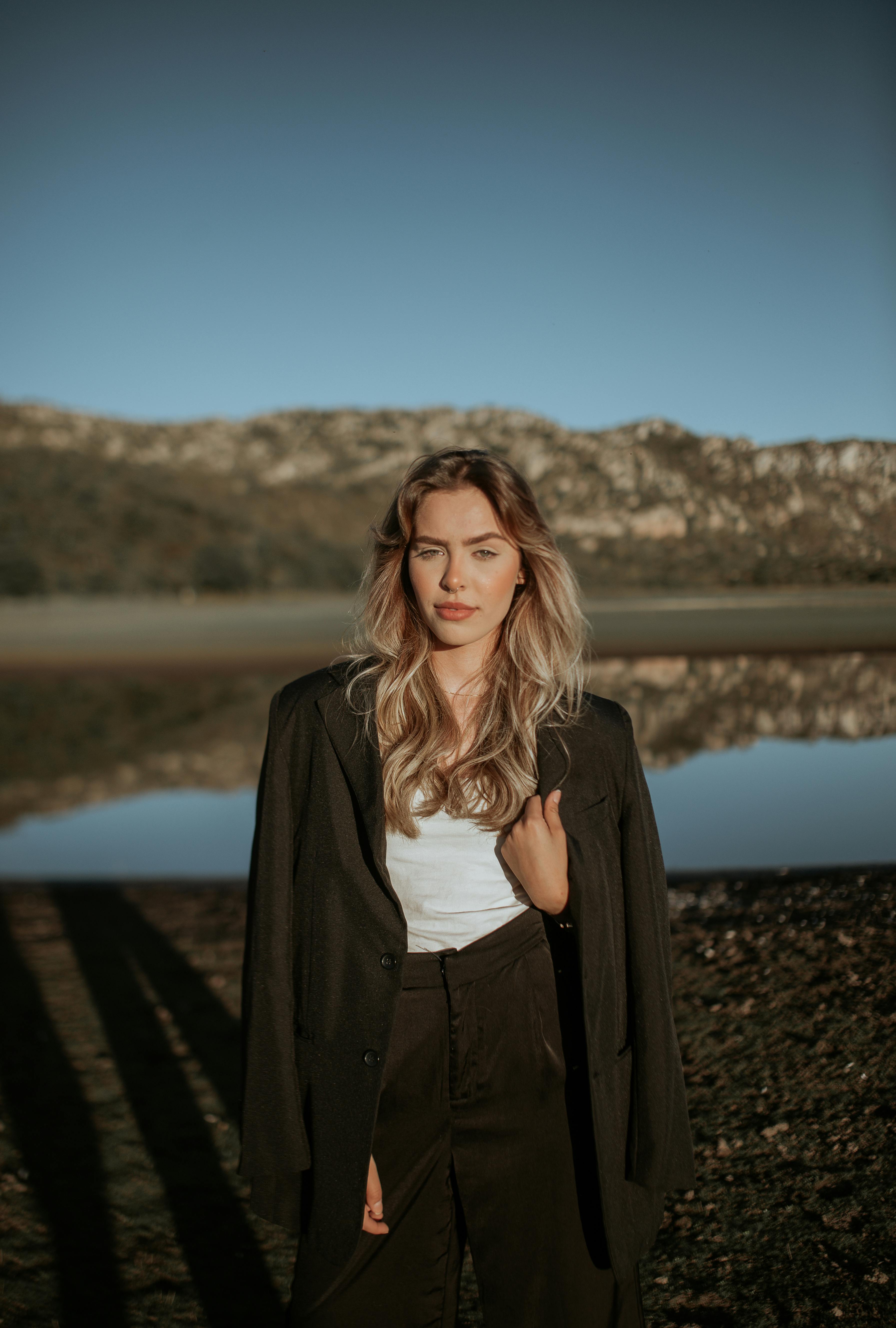 Free Young Fashionable Woman Posing Outside Stock Photo