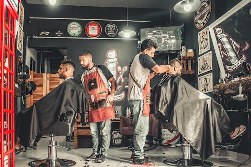 Free Men Having Their Haircut Stock Photo