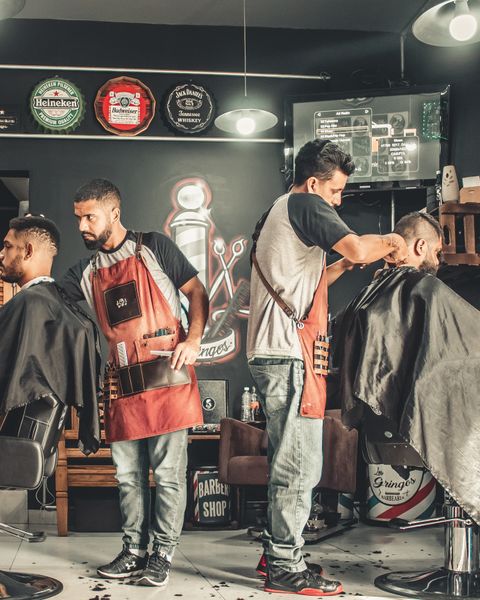 Barber giving a fresh fade