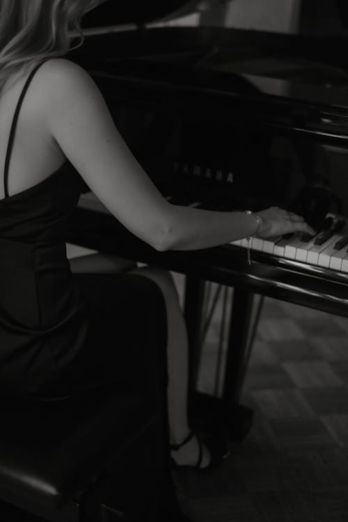 Elegant Woman Playing Piano