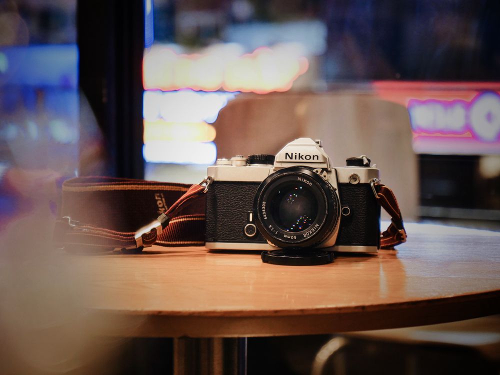 Camera on Table · Free Stock Photo