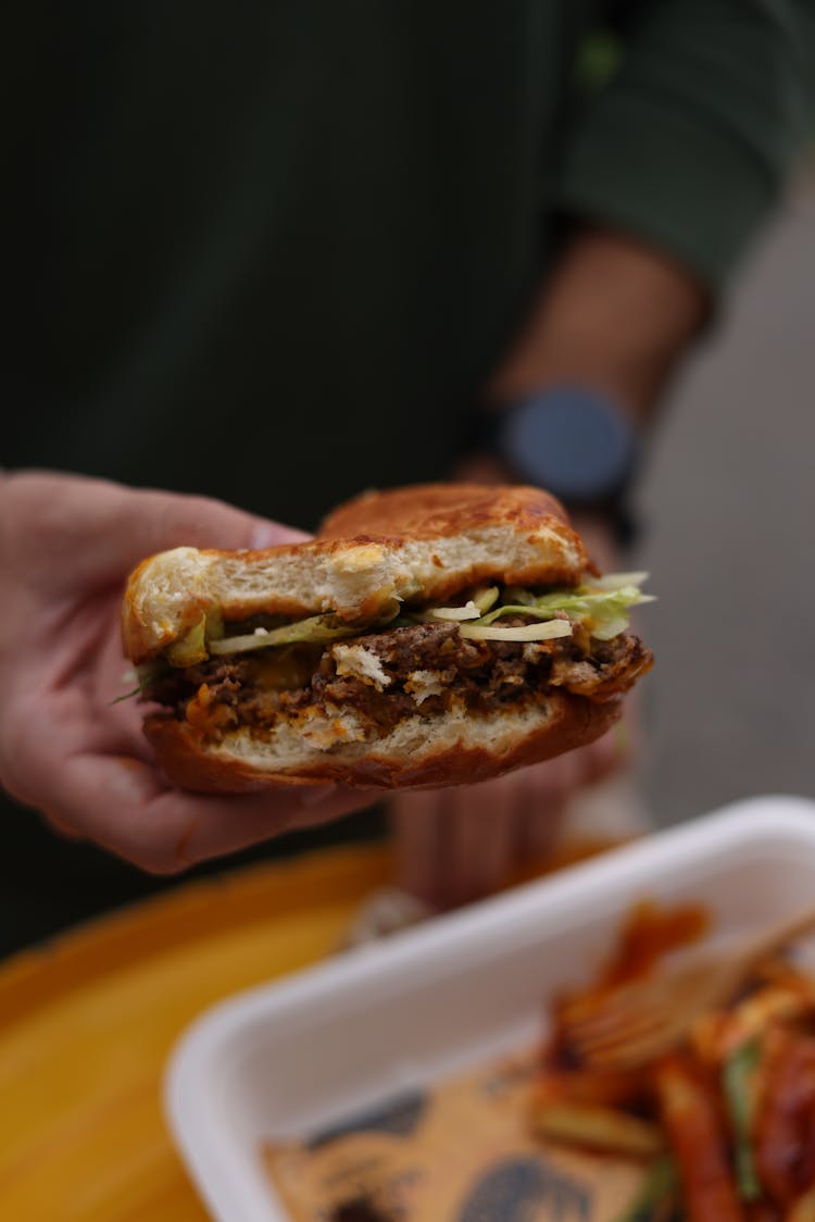 Hand With Beef Burger