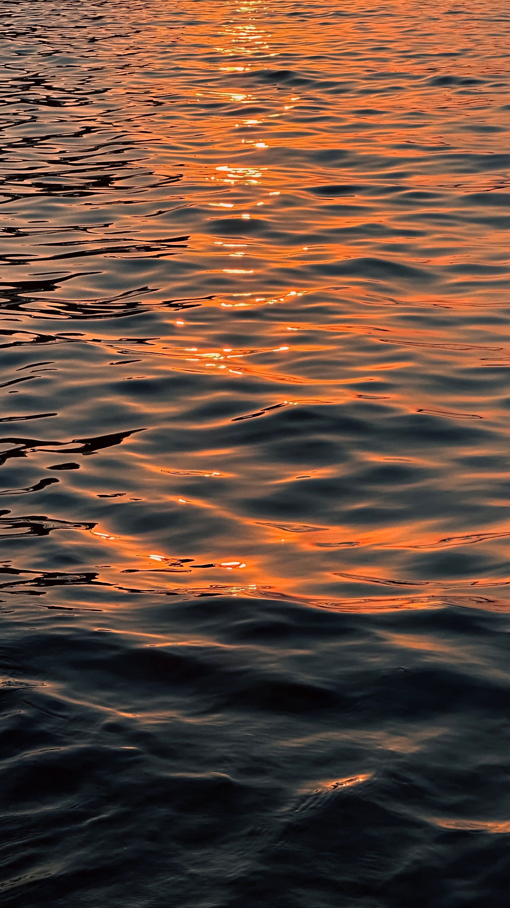 Sunlight Reflecting in Rippled Sea Water · Free Stock Photo