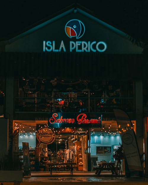 Facade of an Illuminated Bar at Night 