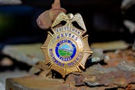 Close-up photo of the Kansas Highway Patrol badge, showcasing intricate design details.