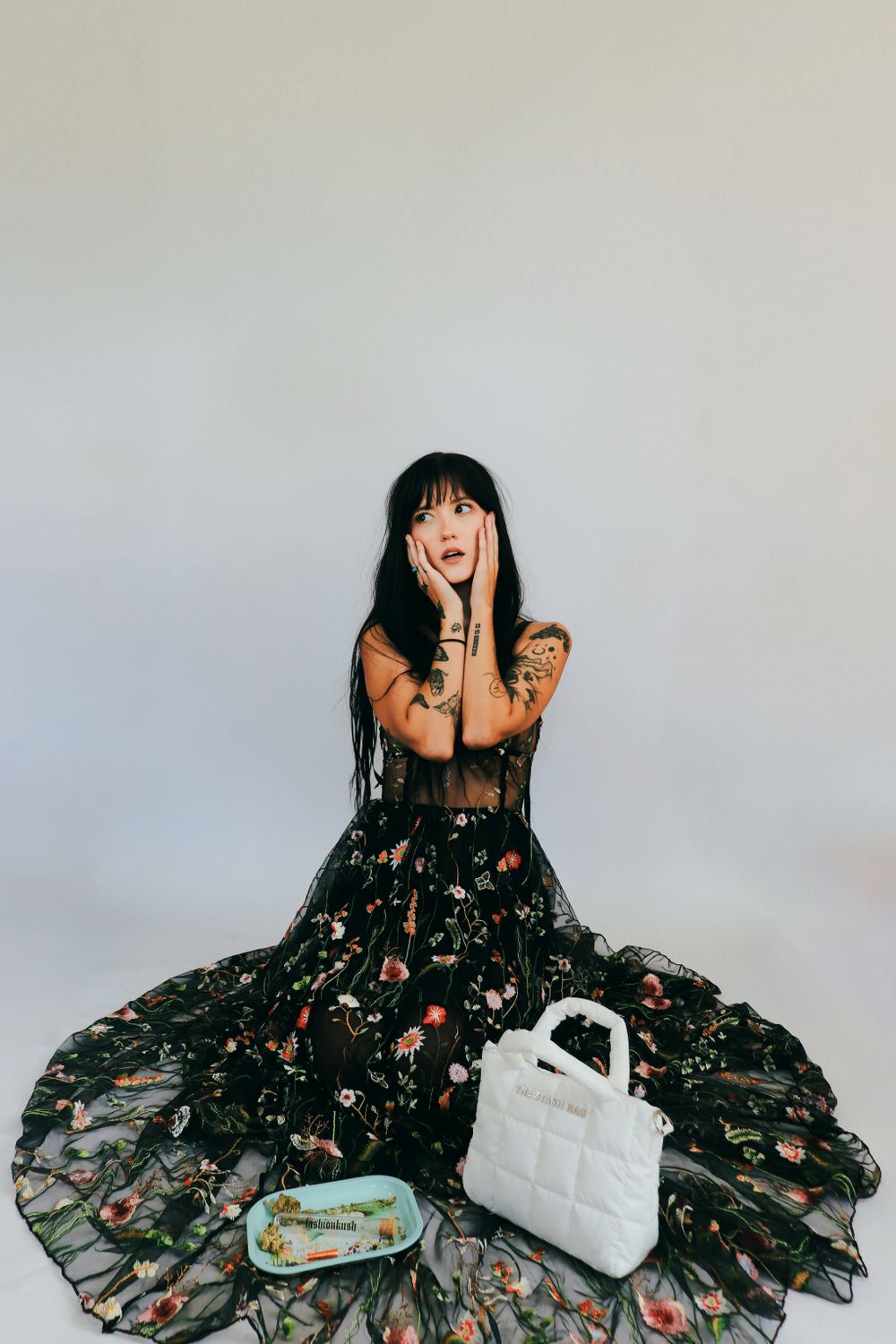Young Woman in a Dress Sitting on the Floor · Free Stock Photo