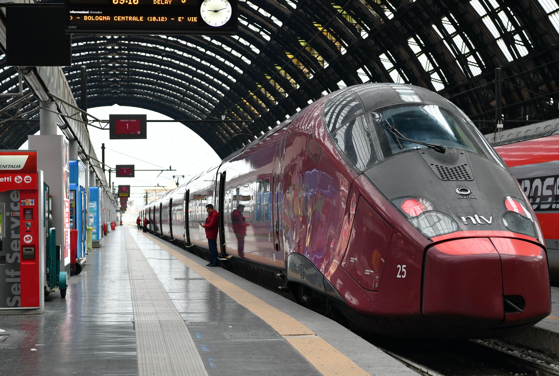 Frecciarossa train at Milano Centrale for Rome to Milan dog travel planning