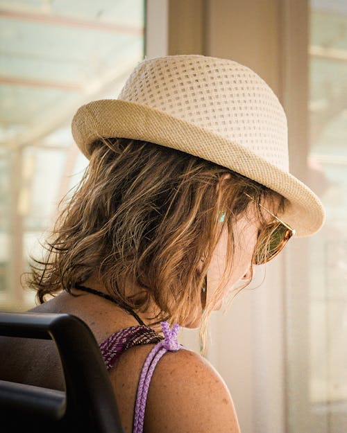 Back View of Woman in Hat