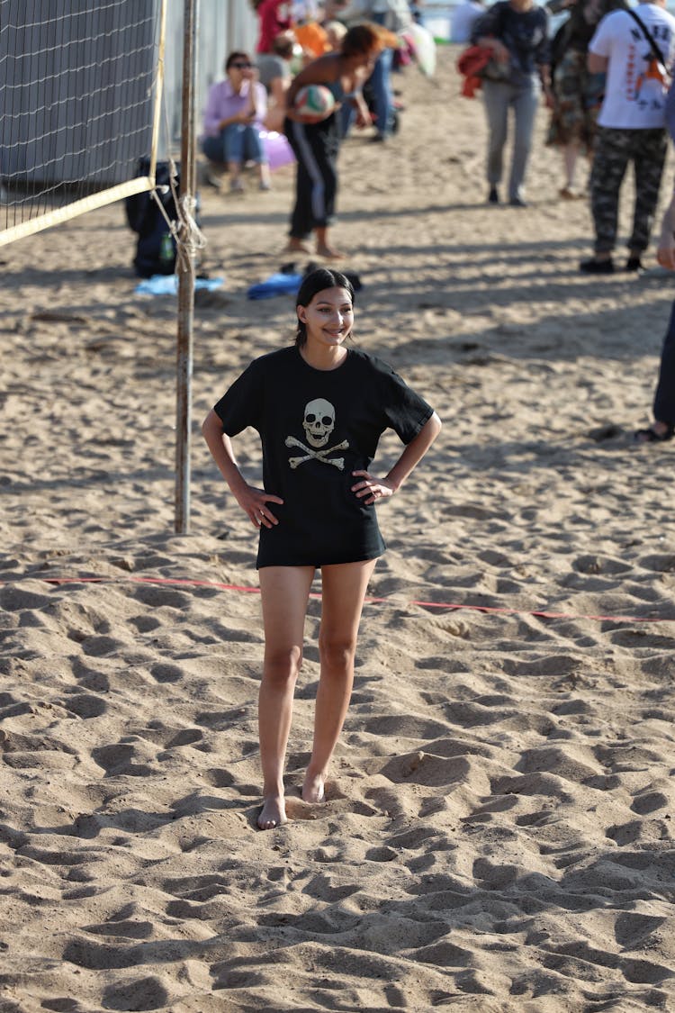 Woman Playing Beach Volleyball