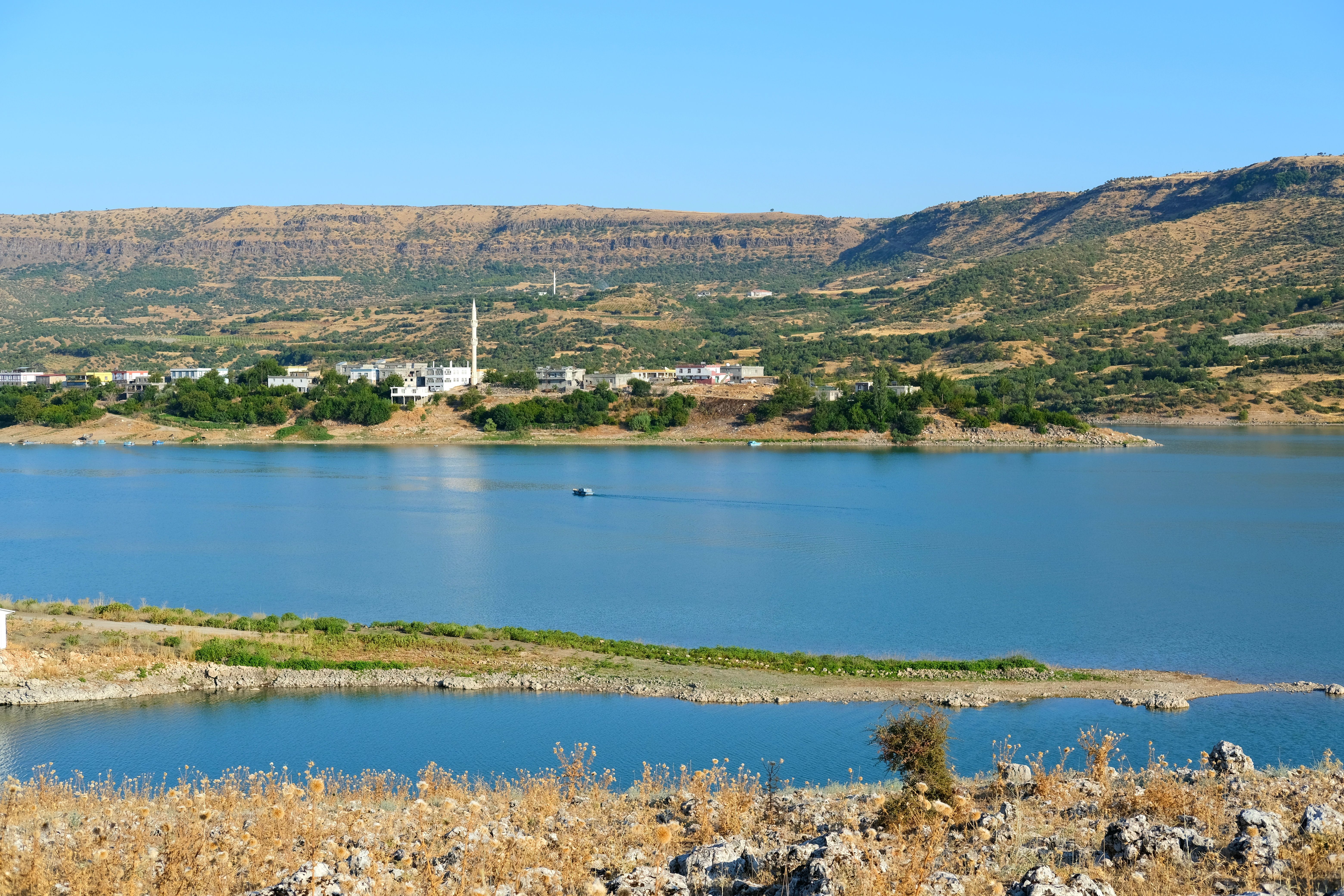 Town by Lake Surrounding by Hills · Free Stock Photo