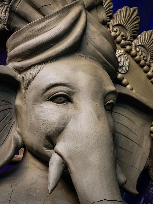 Free Close-up view of a clay Ganesha statue in Kolkata showcasing intricate craftsmanship. Stock Photo