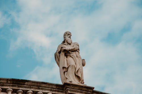 Close-up of a Statue on the Roof of a Building 