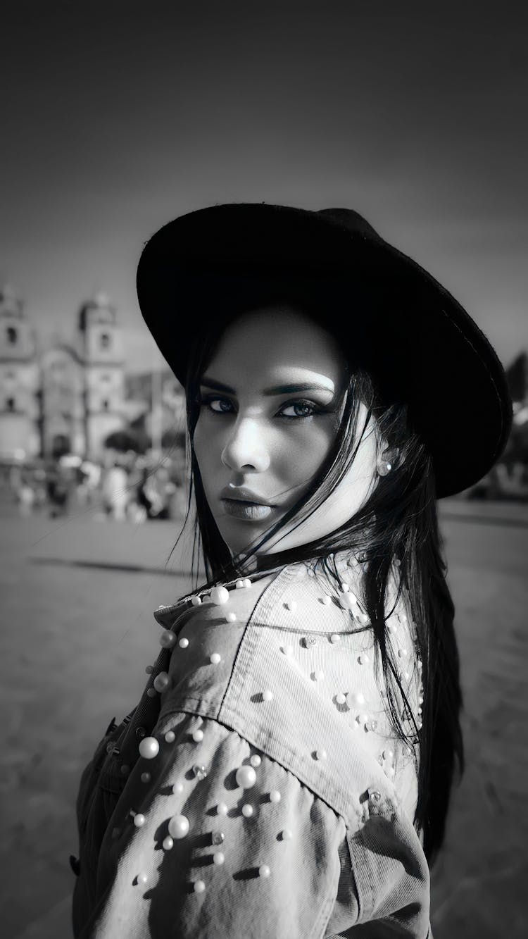 Model Posing In Jacket And Hat