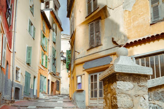 Explore the charming narrow streets and historic architecture of Nice, France's old town.