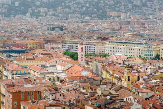 Explore the charming urban landscape of Nice, France, with its iconic red rooftops and historic architecture.