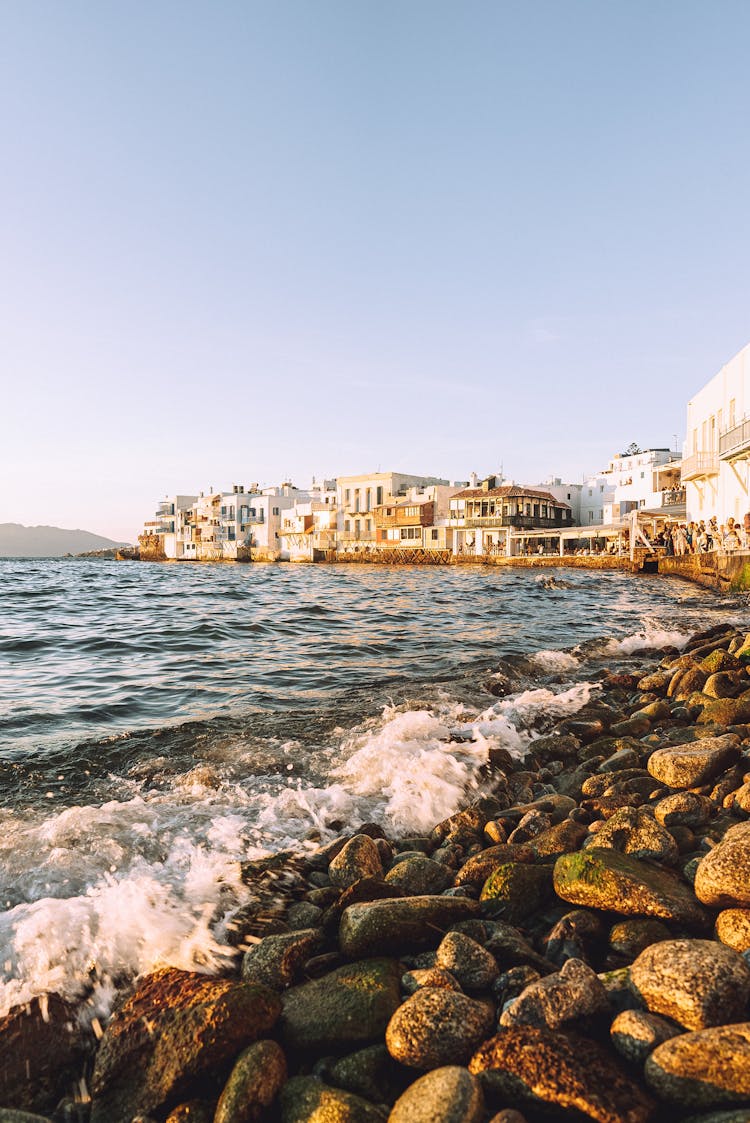 View Of The Shore And Waterfront Buildings On Mykonos, Greece