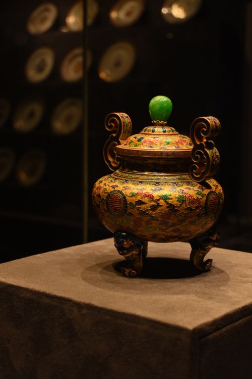 Free Elegant antique pottery with colorful patterns showcased in a museum setting. Stock Photo