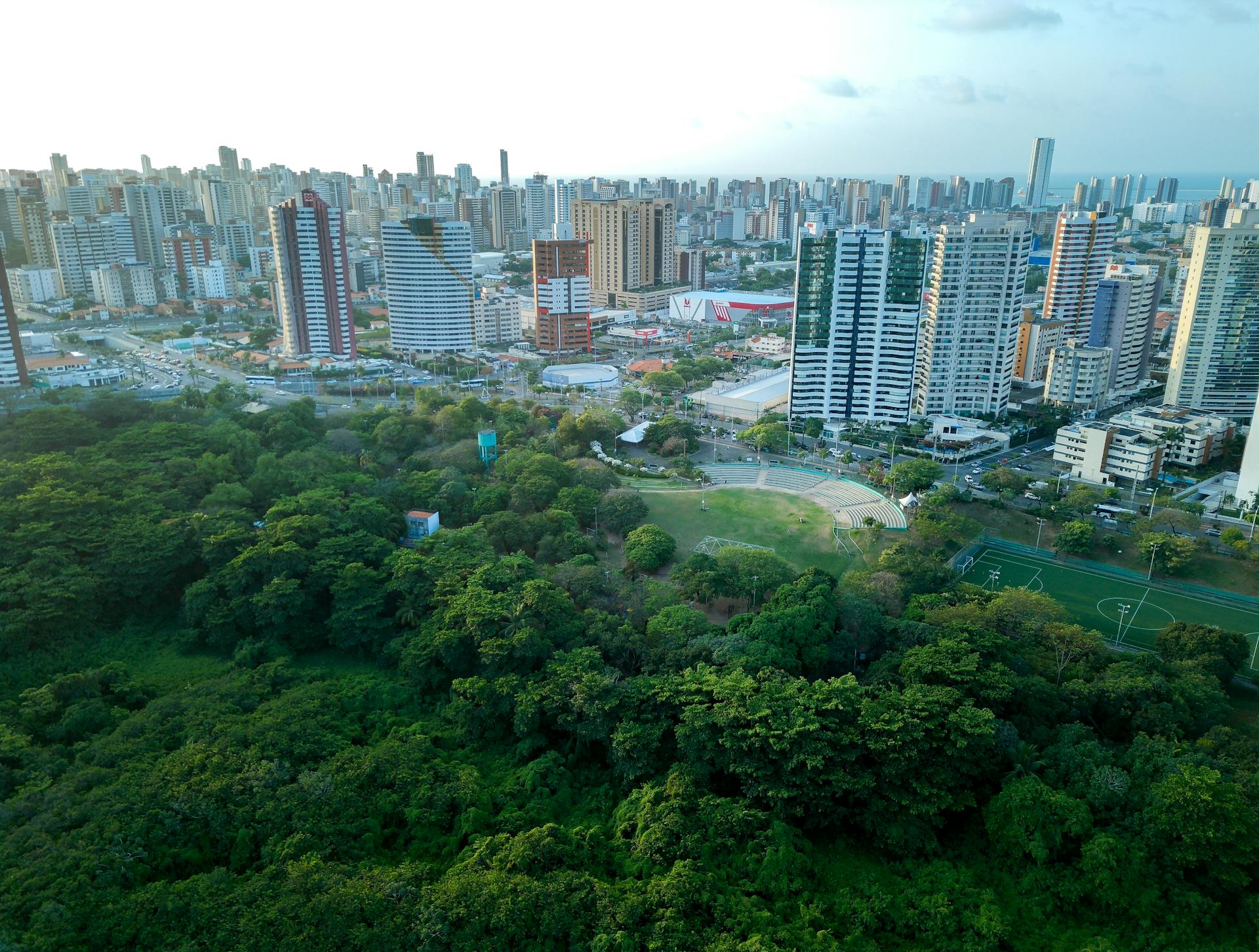 Stunning aerial photo of Fortaleza cityscape with lush urban park.