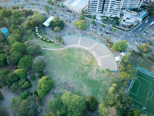 An aerial view of a soccer field and a park