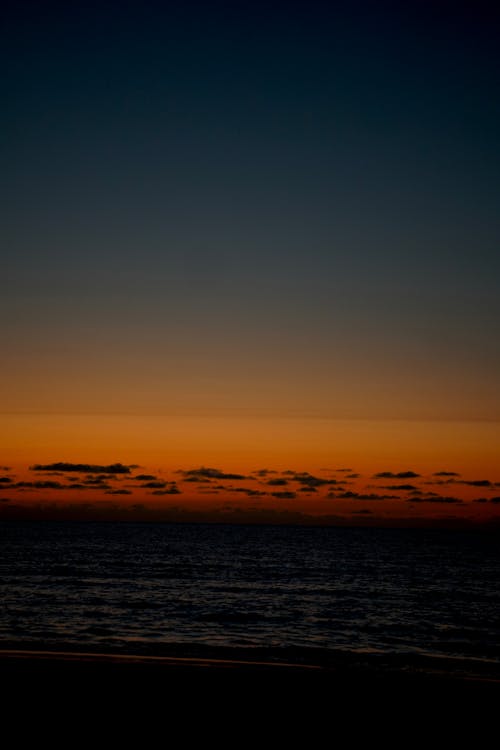 Gratis lagerfoto af gylden solnedgang, strand solnedgang