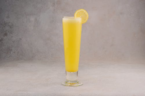 Yellow Cocktail with Lemon Slice