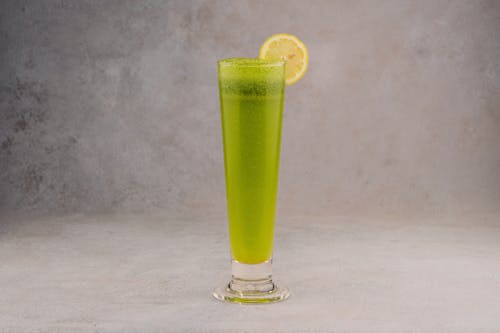 Green Cocktail with Lemon Slice