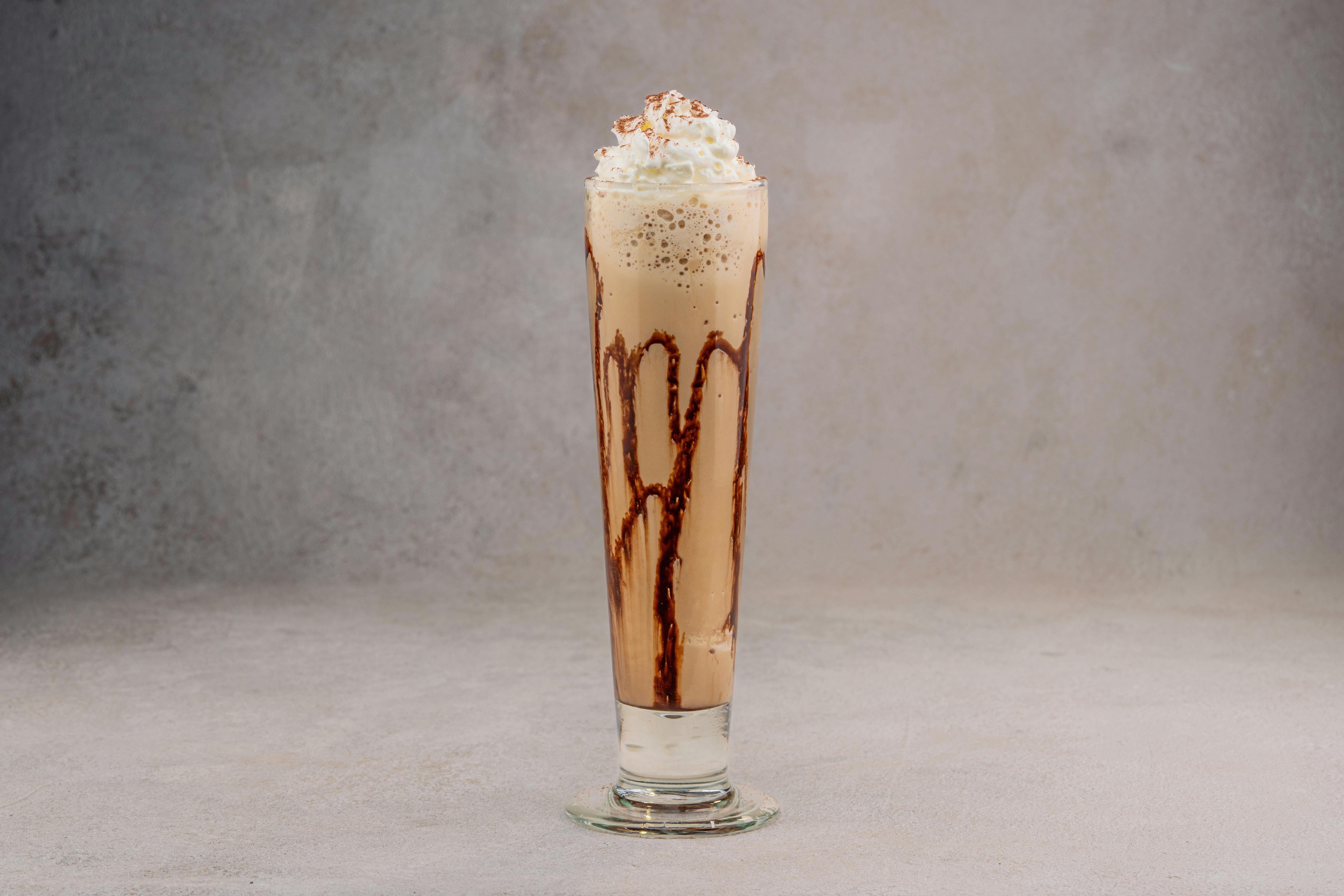 Ice cream mug on table photo – Free Milkshake Image on Unsplash
