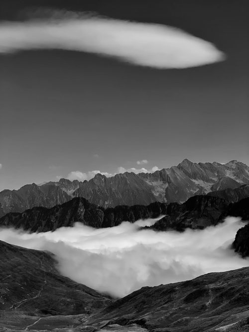Free Breathtaking view of misty mountains in a dramatic black and white shot. Stock Photo
