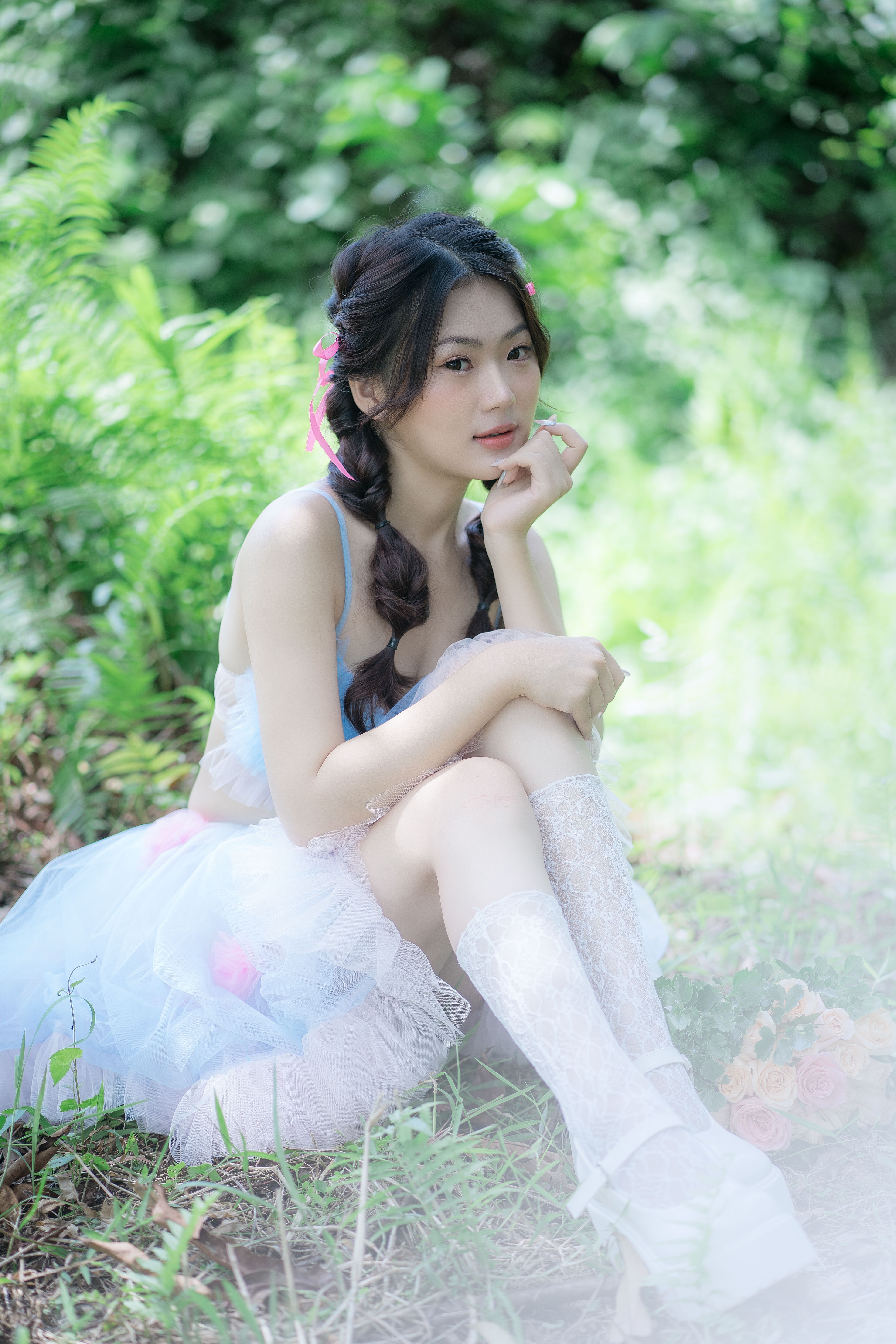 Young Woman in a Dress Sitting on the Ground · Free Stock Photo