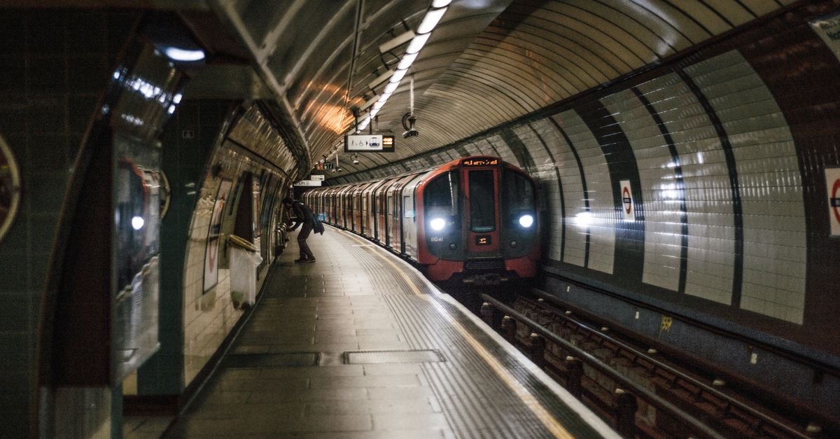 Train Moving In An Underground Train Station Free Stock Photo train-moving-in-an-underground-train-station-free-stock-photo