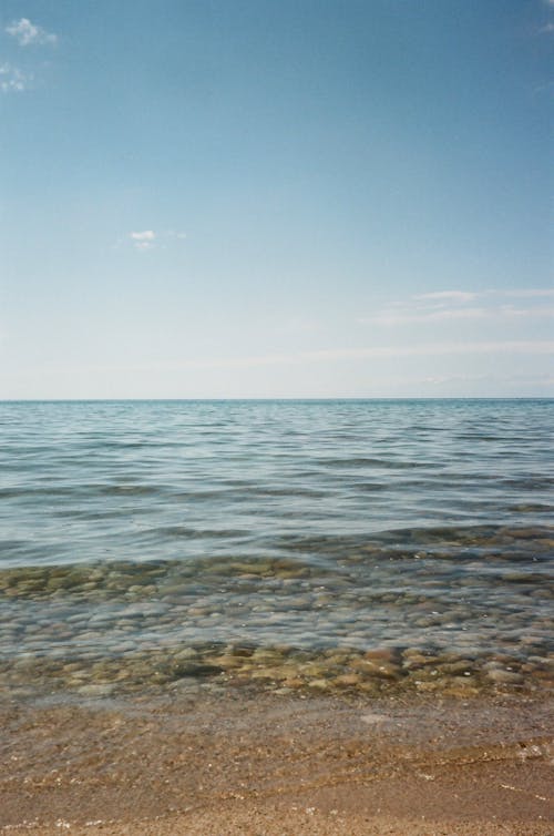Foto profissional grátis de água, areia, litoral
