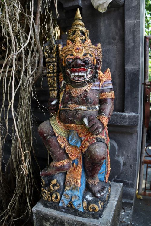 Free Colorful stone guardian statue in a Balinese temple, showcasing intricate traditional craftsmanship. Stock Photo
