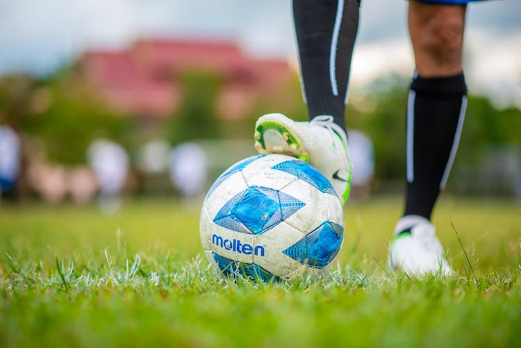 Man Legs On Soccer Ball