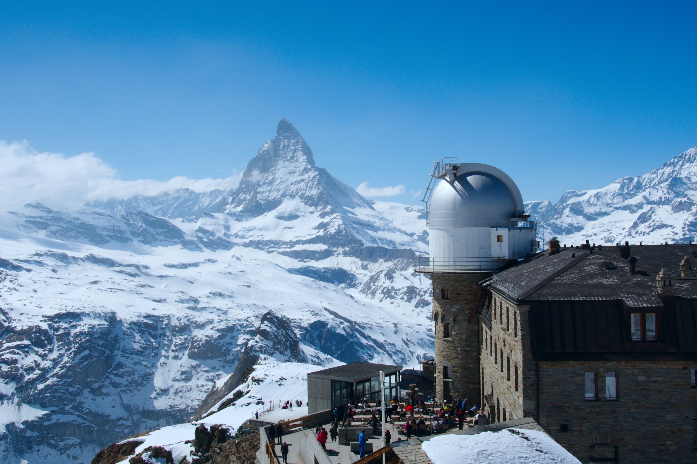 Snow-capped Matterhorn viewed from 3100 Kulmhotel Gornergrat under a clear blue sky.