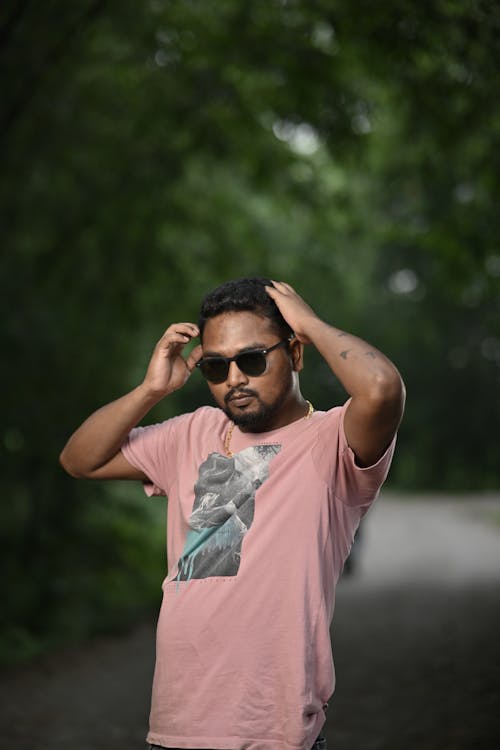 Man in Sunglasses and Pink T-shirt