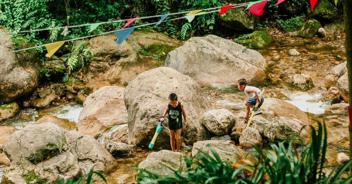 Child Rocks Creek Children Playing on Rocks in Forest · Free Stock Photo