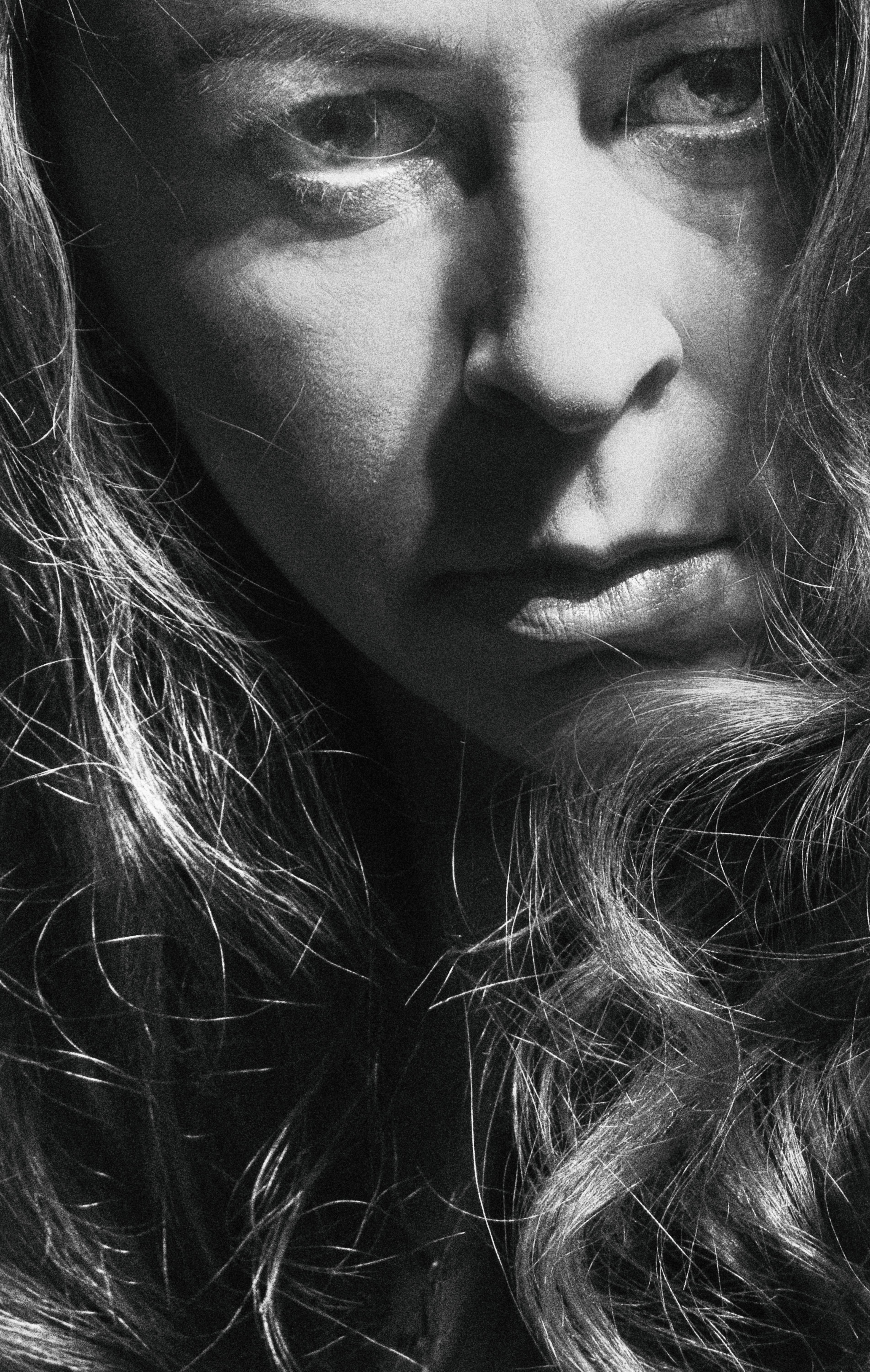 Serious Woman Face in Black and White · Free Stock Photo