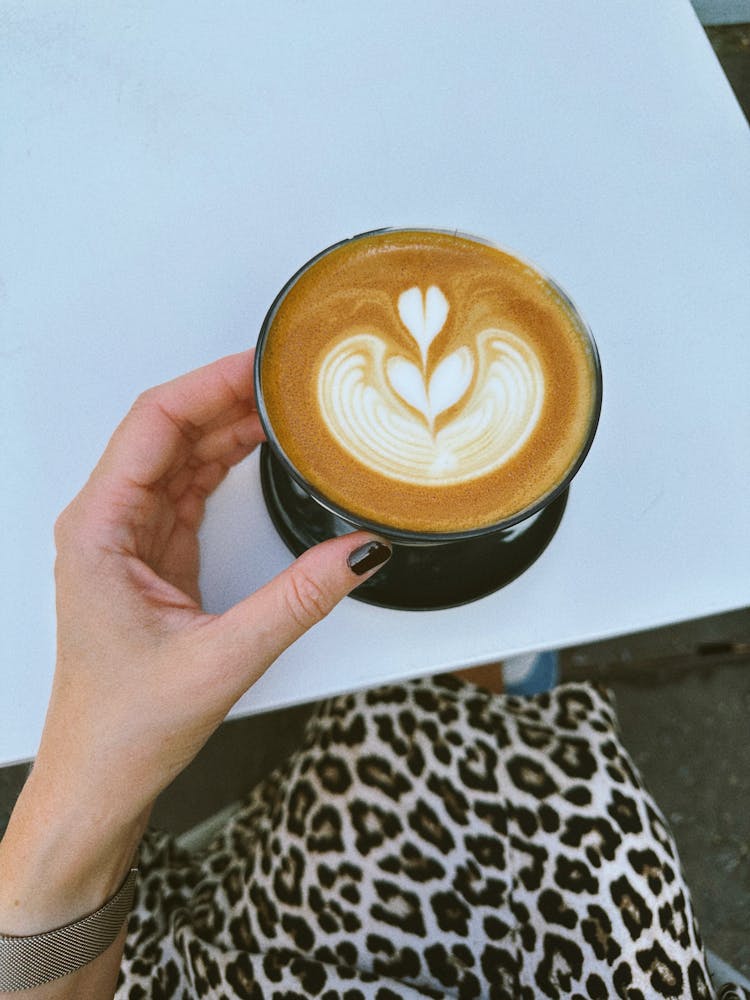 Woman Hand Holding Coffee Cup