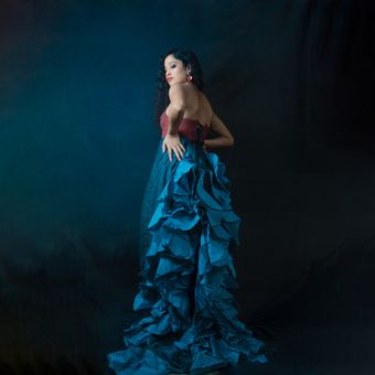 Model in a sculptural blue evening gown — photo by Yash Singh on Pexels