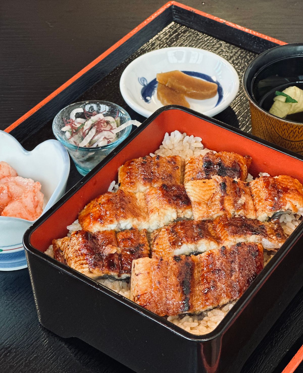 A traditional Japanese unagi donburi bowl of grilled eel served over rice