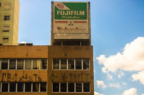 Facade of an Old Rundown Building in City 