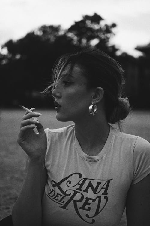 Portrait of an Attractive Woman Smoking a Cigarette