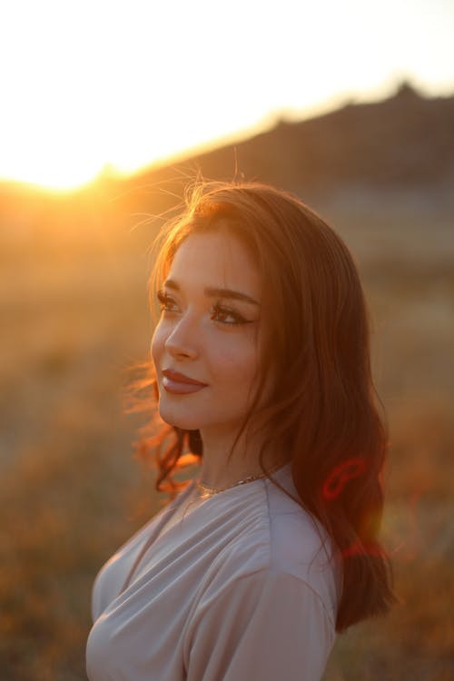 Portrait of Smiling Woman at Sunset