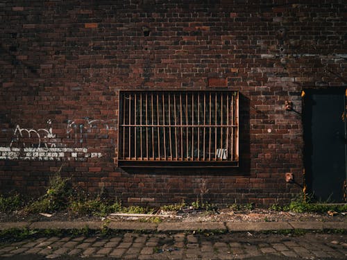 Grille in the Window of an Abandoned Building