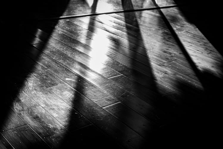 Sun Reflecting On The Wooden Floor