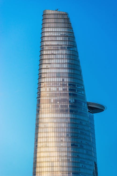 Foto profissional grátis de arquitetura contemporânea, arranha-céus, céu azul