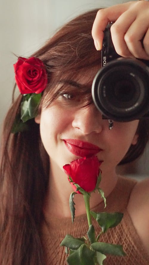 Portrait of a Woman with Roses and Camera