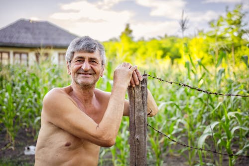 An aged man who enjoys life in the village