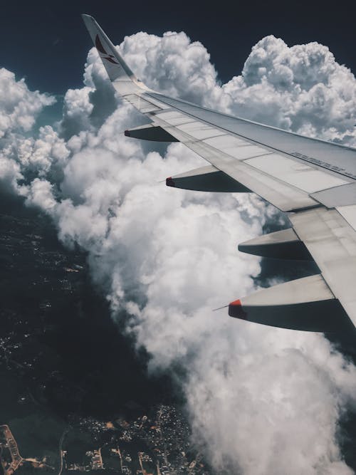 Aircraft Wing Over Clouds