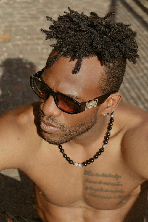 Foto profissional grátis de colar, dreadlocks, homem afro-americano